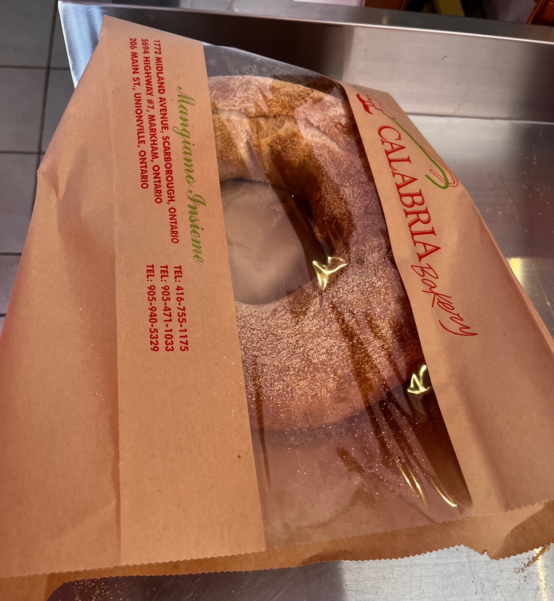 Fresh baked bread in our signature paper